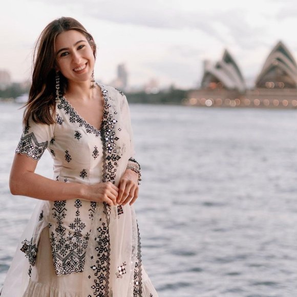 BEAUTIFUL SARA ALI KHAN WHITE SHRARA SET WITH ALL OVER SEQUENCE EMBROIDFERY WORK - Picture 2 of 12